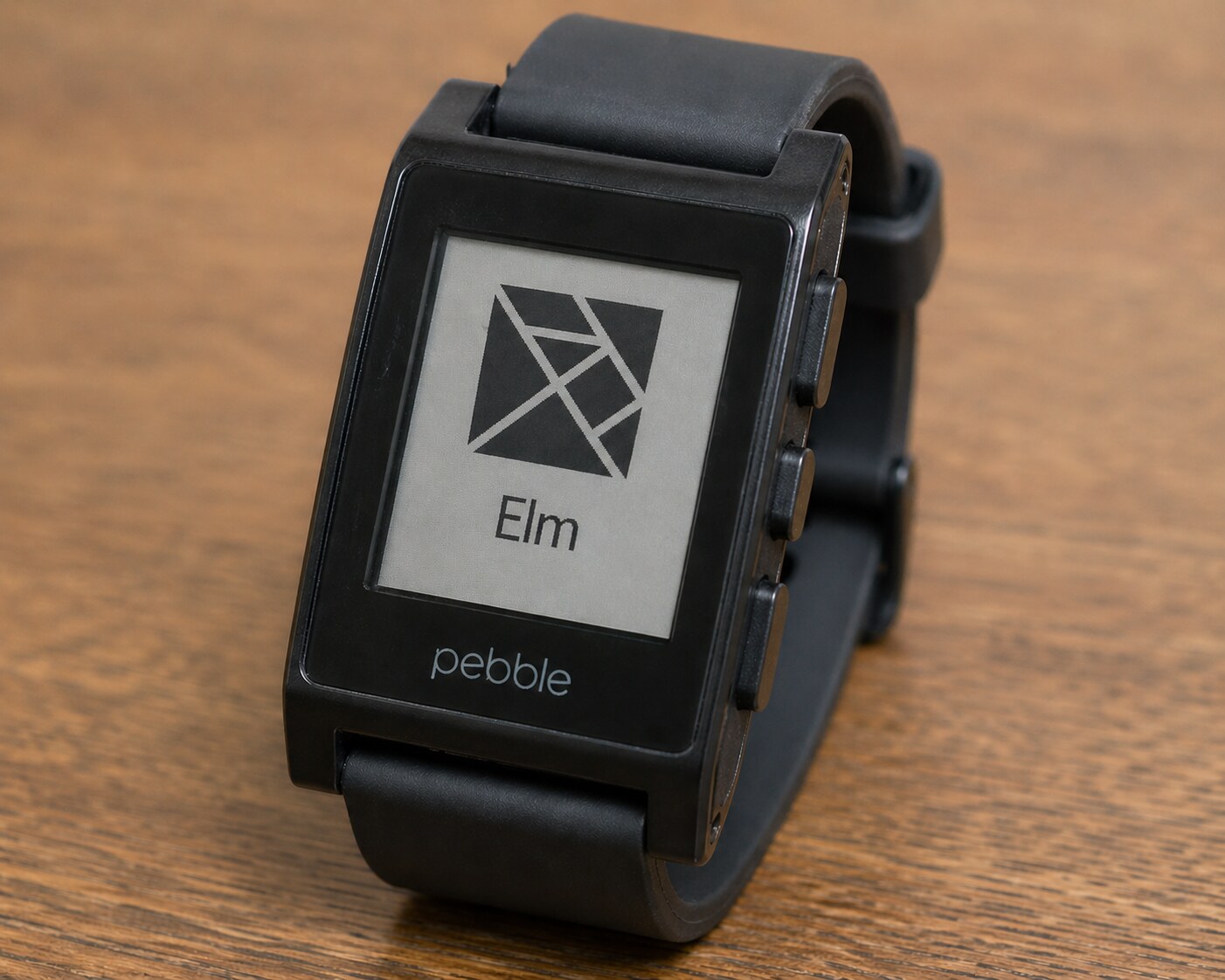 Pebble watch displaying an Elm Pebble watchface